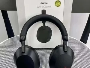 Black over-ear headphones on a stand