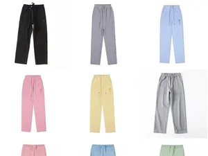 A grid of plain joggers in black, grey, blue, pink and yellow